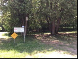 Parking area and sign.