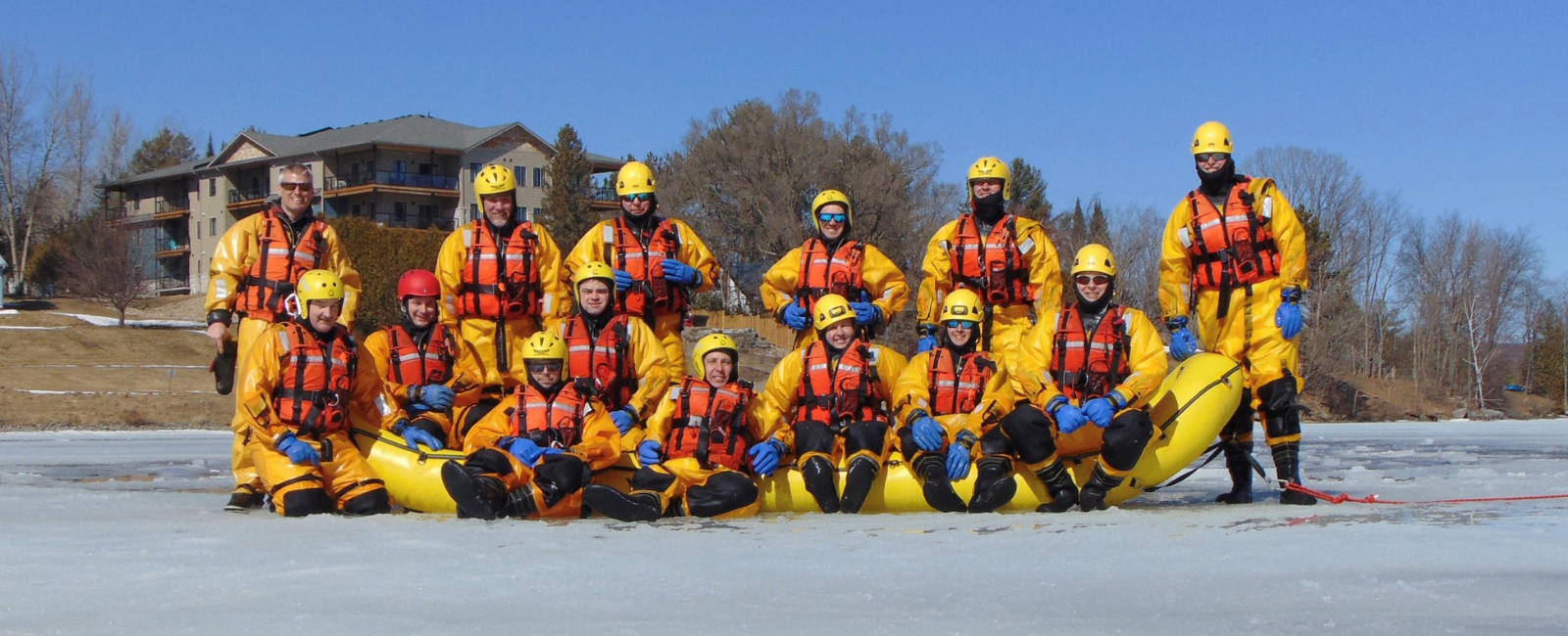 14 Members of the Dysart Fire Department Practicing Ice Safety Training